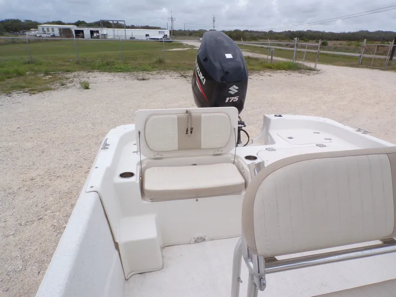 Slide: The Image of 2013 Carolina Skiff 238 DLV with Suzuki 175 engine, beige interior. - 22