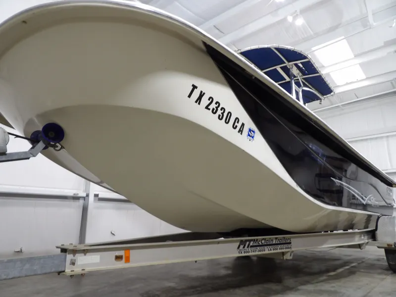 Slide: The Image of 2013 Carolina Skiff 238 DLV on trailer, front view. - 5
