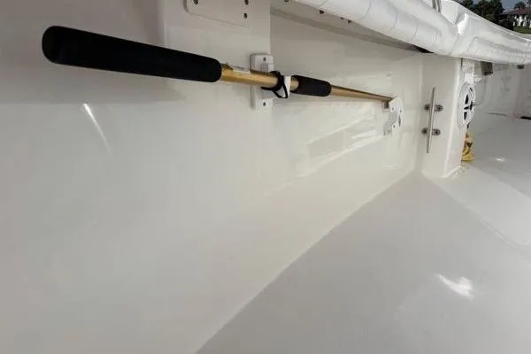 Slide: The Image of 2018 Regulator 23 Forward Seating boat interior with mounted rod holder. - 33