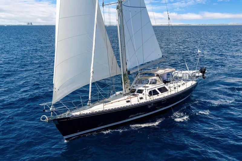 The Image of Sailing yacht Hylas 54, 2009 model, cruising on open ocean under clear skies. - 1