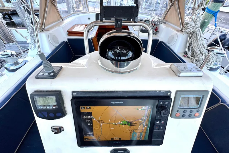Slide: The Image of Cockpit of 2009 Hylas 54 yacht with navigation instruments and compass. - 11