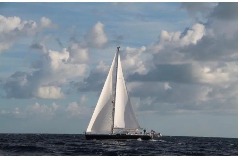Slide: The Image of Sailing yacht Hylas 54 (2009) navigating open sea under cloudy sky. - 2