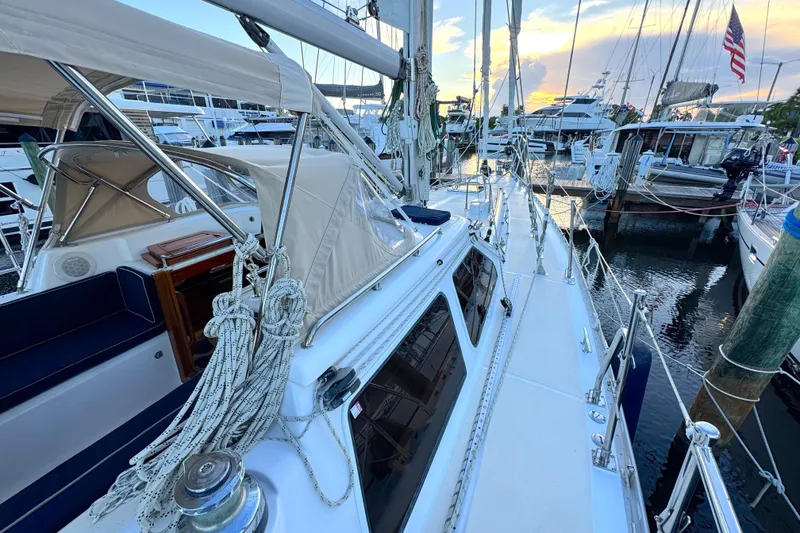 Slide: The Image of 2009 Hylas 54 sailboat docked at marina during sunset. - 5