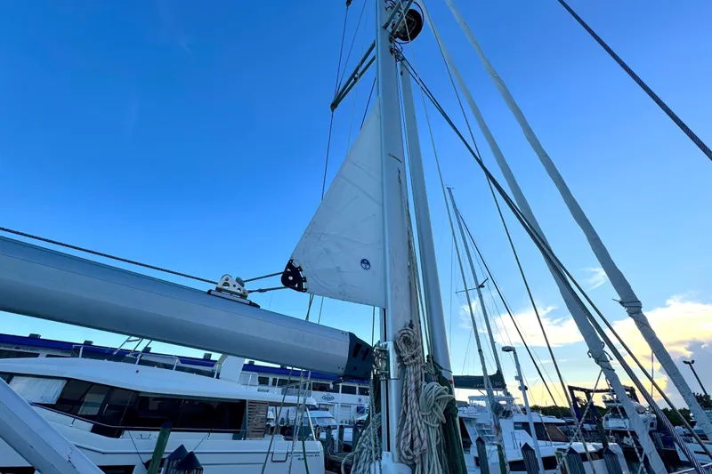 Slide: The Image of Sailboat mast and rigging of 2009 Hylas 54 against a clear blue sky. - 7