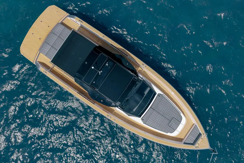 Slide: The Image of Overhead view of 2024 Pardo Yachts 43 on blue ocean water. - 2