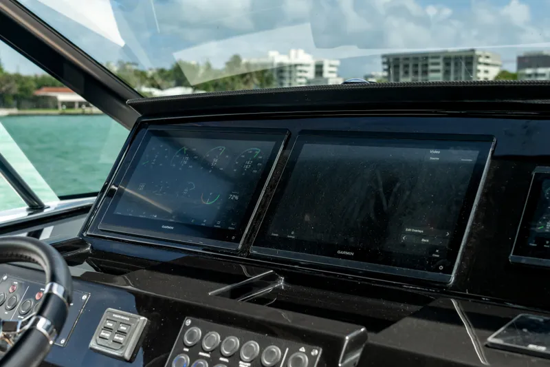 Slide: The Image of Dashboard of 2024 Pardo Yachts 43 with Garmin navigation displays. - 21