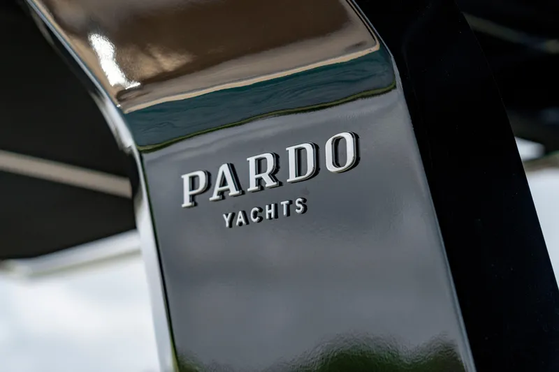 Slide: The Image of Close-up of 2024 Pardo Yachts 43 logo on sleek black surface. - 30