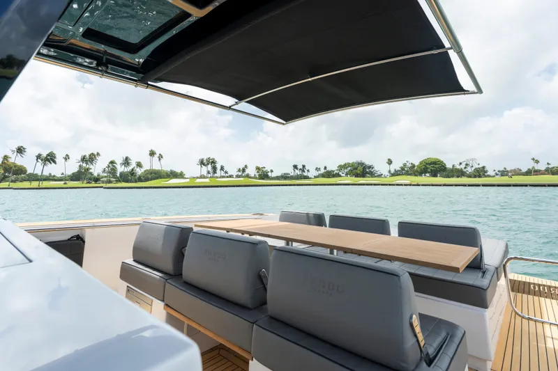 Slide: The Image of Luxurious 2024 Pardo Yachts 43 with elegant seating and scenic waterfront view. - 38