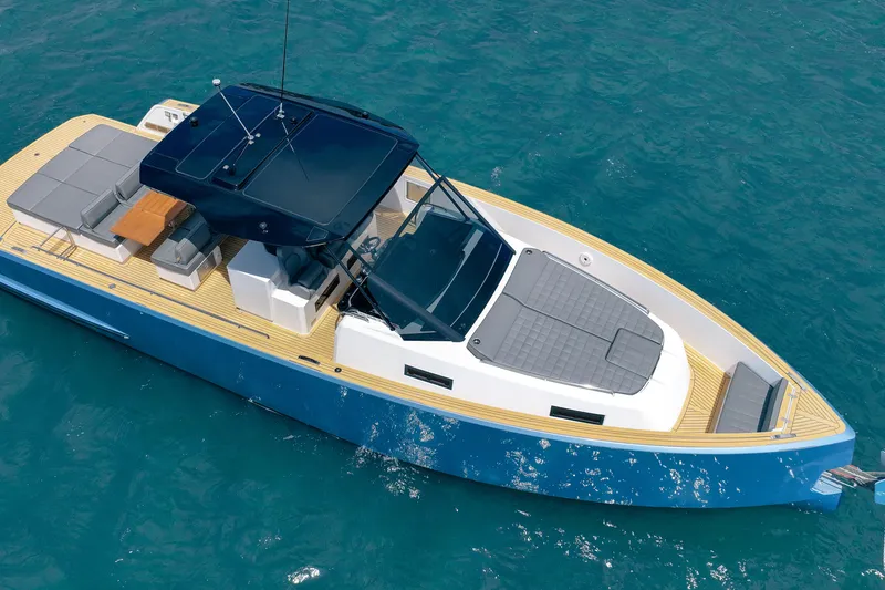 Slide: The Image of 2024 Pardo Yachts 43 cruising on clear blue water, showcasing sleek design and luxury features. - 4