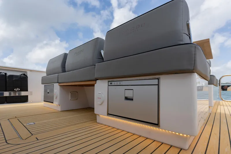 Slide: The Image of 2024 Pardo Yachts 43 deck with seating and storage, featuring sleek design and wood finish. - 42
