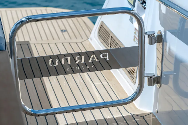 Slide: The Image of 2024 Pardo Yachts 43, stainless steel gate detail on teak deck. - 46