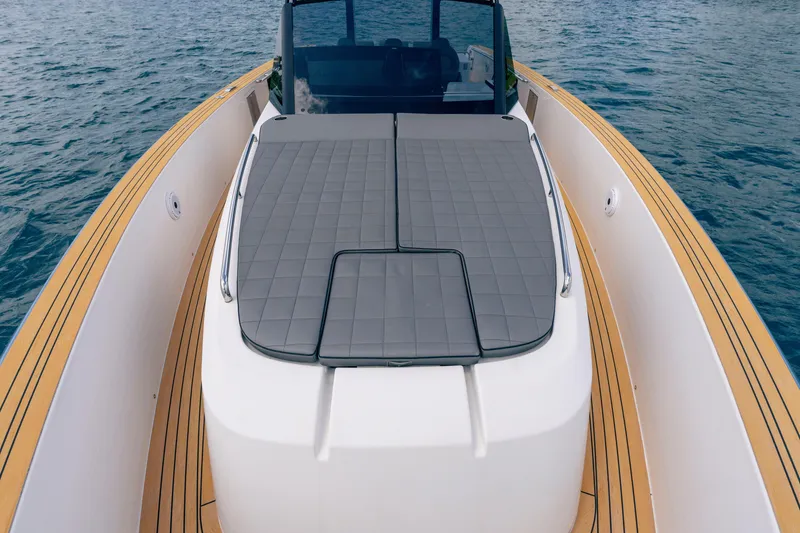 Slide: The Image of 2024 Pardo Yachts 43 with sleek deck design on calm water. - 51