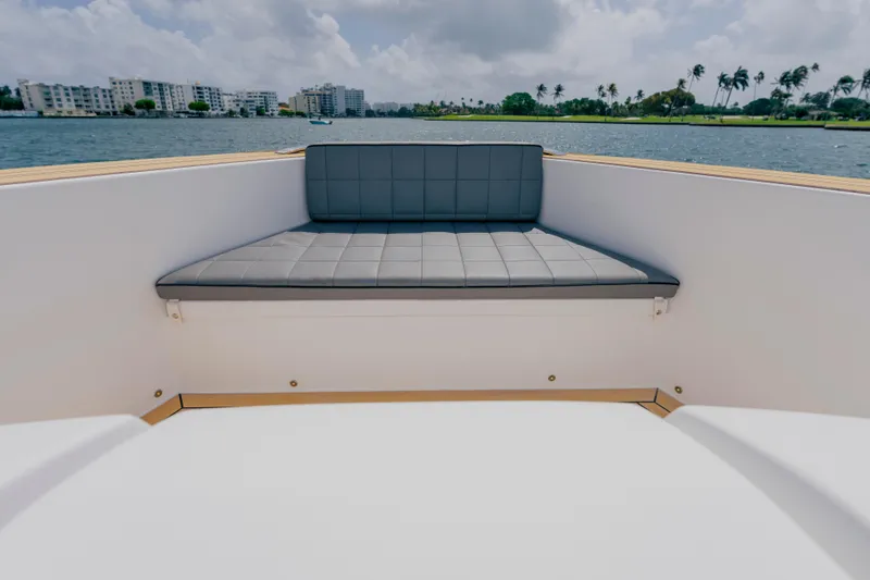 Slide: The Image of Luxurious seating area on 2024 Pardo Yachts 43, overlooking serene waterfront. - 55