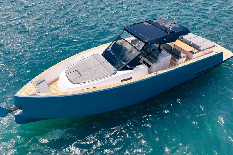 Slide: The Image of 2024 Pardo Yachts 43 cruising on clear blue water, showcasing sleek design and luxury features. - 6