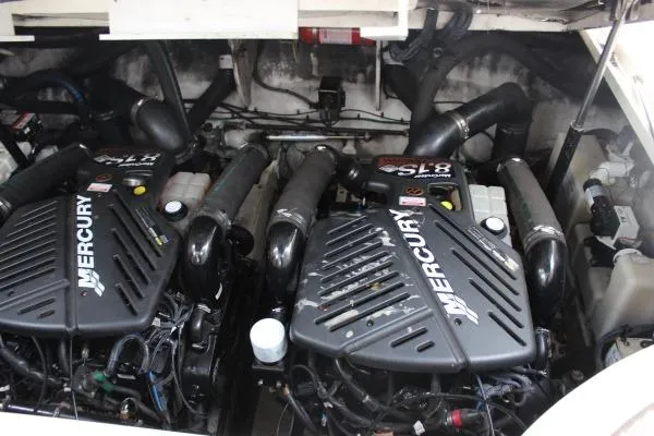 Slide: The Image of Twin Mercury engines in a 2006 Sea Ray 340 Sundancer boat. - 16