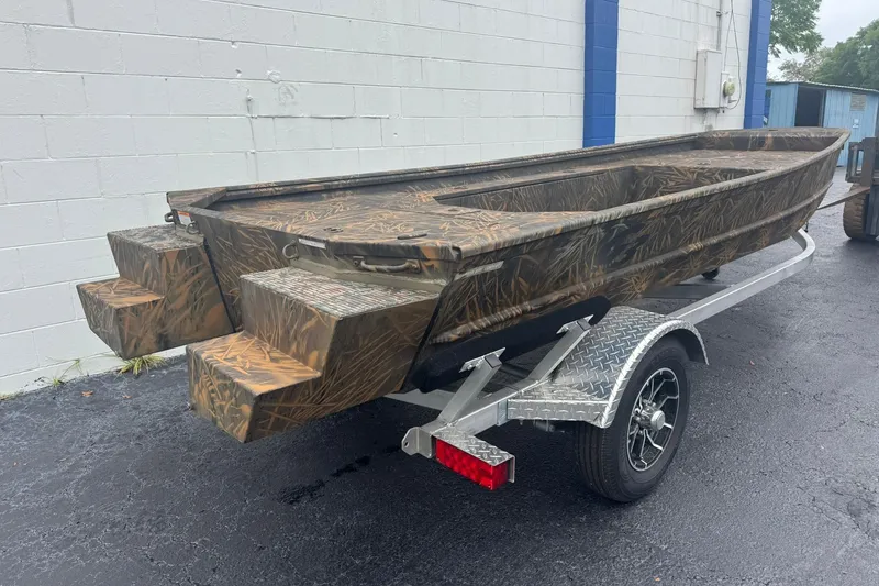 Slide: The Image of 2026 G3 Gator Tough 16 DK boat on trailer, featuring camouflage design. - 3