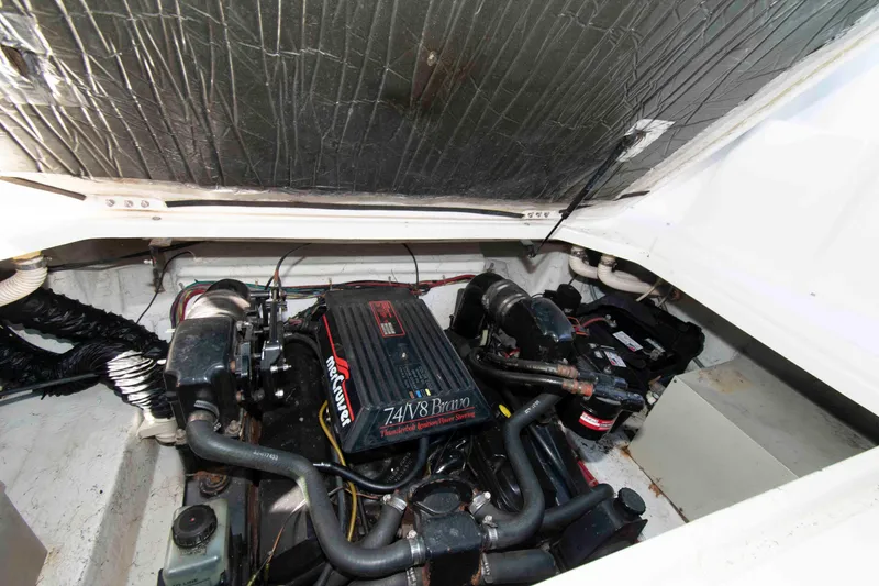 Slide: The Image of Engine compartment of a 1994 Bayliner 2855 Ciera boat with MerCruiser V8 engine. - 12