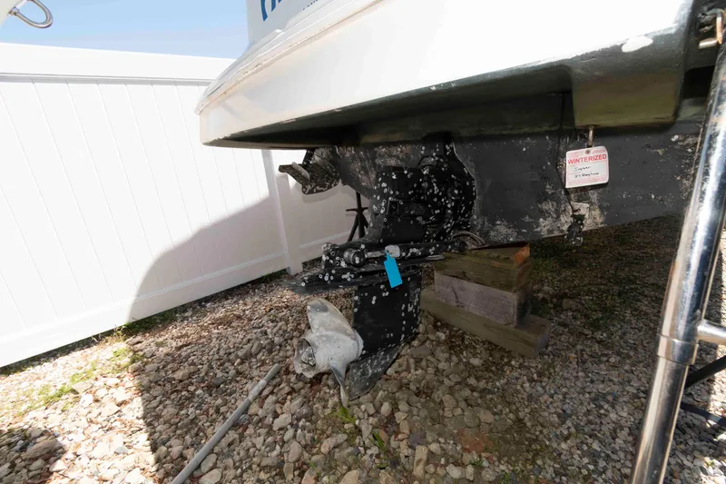 Slide: The Image of 1994 Bayliner 2855 Ciera boat stern with winterized tag and propeller visible. - 13