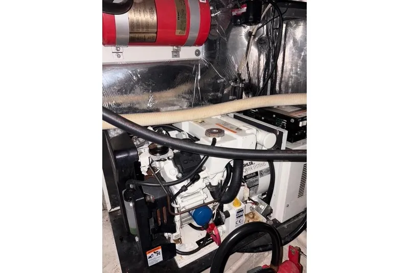 Slide: The Image of Engine room of 2003 Four Winns 378 Vista boat with Kohler power system. - 19