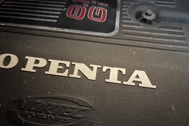 Slide: The Image of Close-up of Volvo Penta engine cover on 2003 Four Winns 378 Vista boat. - 21