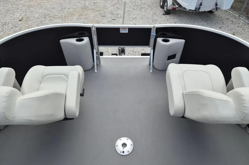 Slide: The Image of 2025 Sylvan Mirage Fish 8522 Party Fish 4.0 boat interior with seating and cup holders. - 3