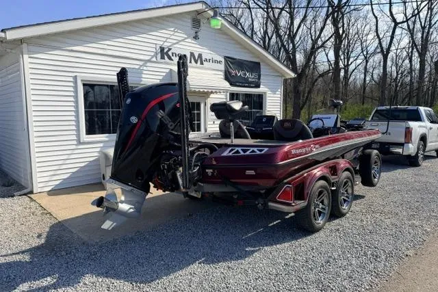 Slide: The Image of 2021 Ranger Z520L Cup-Equipped boat parked outside a marine shop. - 23