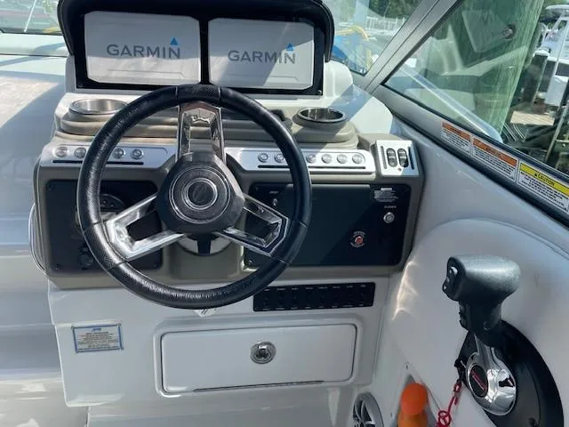 Slide: The Image of 2023 Crownline 270 CR boat dashboard with Garmin navigation system. - 15