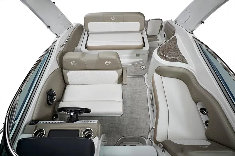 Slide: The Image of 2023 Crownline 270 CR boat interior with beige and white seating. - 32