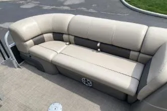 Slide: The Image of 2023 Sun Tracker SportFish 22 DLX pontoon boat with beige seating. - 11