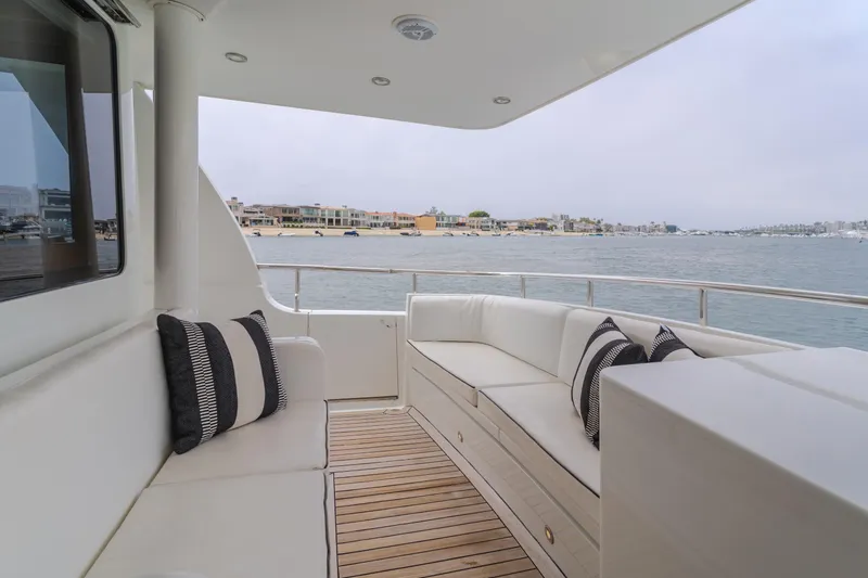 Slide: The Image of Luxurious deck of 2006 Cheoy Lee 72' Raised Pilot House yacht with waterfront view. - 11
