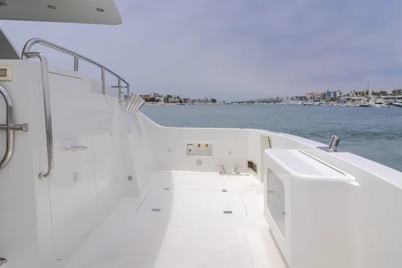 Slide: The Image of Spacious deck of 2006 Cheoy Lee 72' Raised Pilot House yacht overlooking marina. - 13