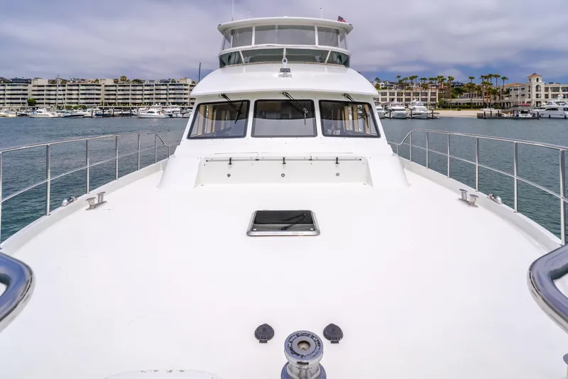 Slide: The Image of 2006 Cheoy Lee 72' Raised Pilot House yacht docked in a marina. - 15
