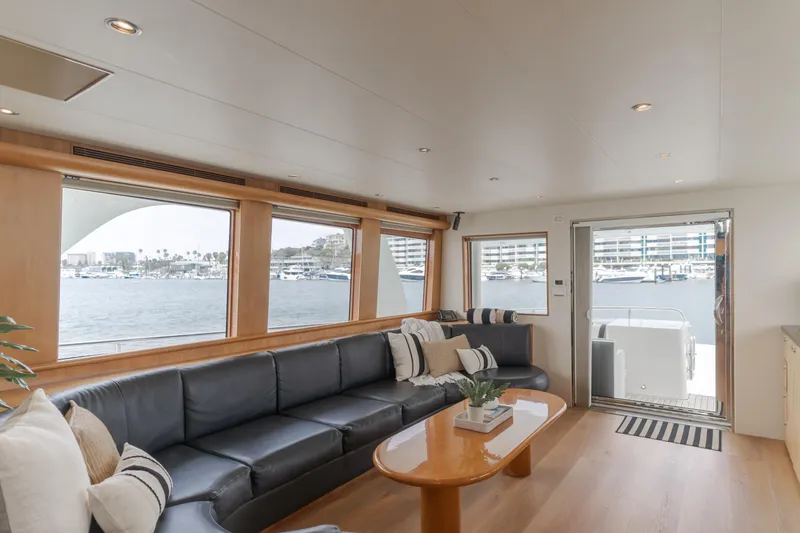 Slide: The Image of Luxurious interior of 2006 Cheoy Lee 72' Raised Pilot House yacht with waterfront views. - 17