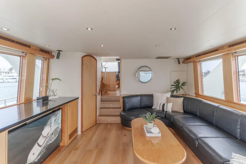 Slide: The Image of Luxurious interior of 2006 Cheoy Lee 72' Raised Pilot House yacht with elegant seating and decor. - 18