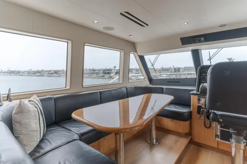 Slide: The Image of Luxurious interior of 2006 Cheoy Lee 72' Raised Pilot House yacht with panoramic windows. - 22
