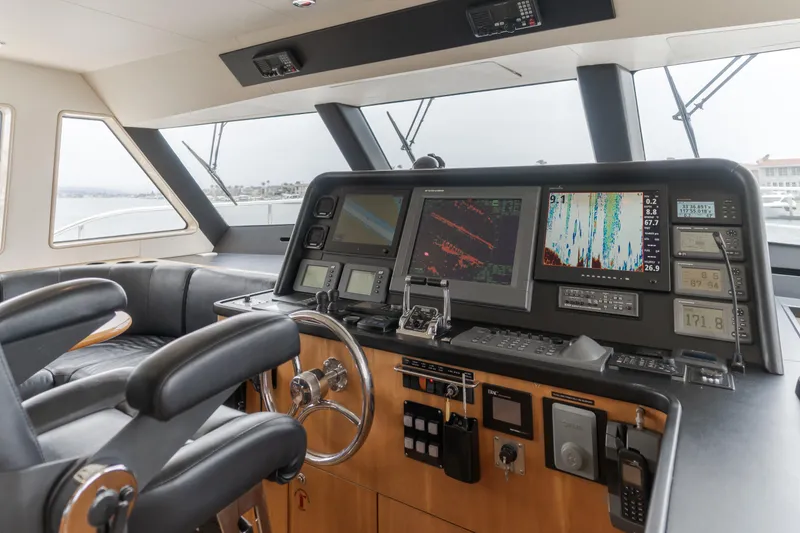 Slide: The Image of Pilot house interior of 2006 Cheoy Lee 72' yacht with navigation equipment and seating. - 24