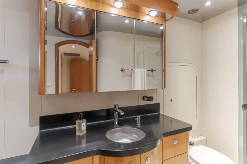 Slide: The Image of Luxurious bathroom in 2006 Cheoy Lee 72' Raised Pilot House yacht, featuring sleek design and modern fixtures. - 28