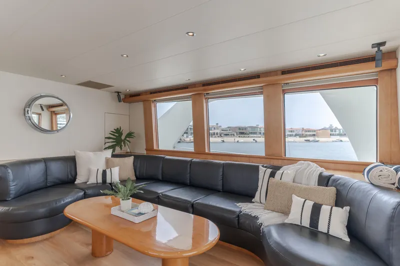 Slide: The Image of Luxurious interior of 2006 Cheoy Lee 72' Raised Pilot House yacht with elegant seating. - 3