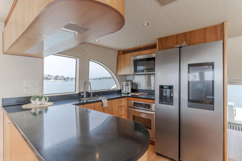 Slide: The Image of Luxurious kitchen interior on 2006 Cheoy Lee 72' Raised Pilot House yacht. - 4