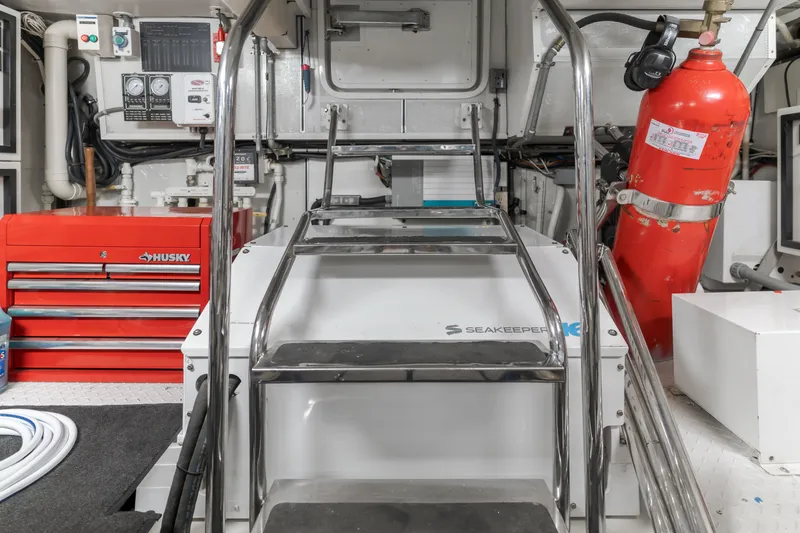 Slide: The Image of Engine room of 2006 Cheoy Lee 72' Raised Pilot House with Seakeeper stabilizer and Husky tool chest. - 45