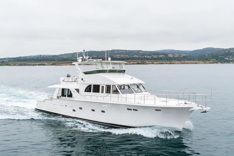 Slide: The Image of 2006 Cheoy Lee 72' Raised Pilot House yacht cruising on calm waters. - 51