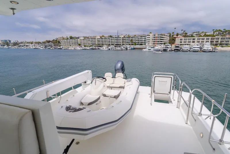 Slide: The Image of Luxury yacht deck with tender, Cheoy Lee 72' Raised Pilot House, 2006, marina view. - 8