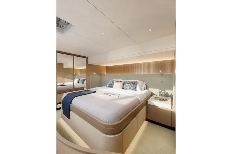 Slide: The Image of Luxurious bedroom on the ILIAD 60 yacht, model year 2026. - 5