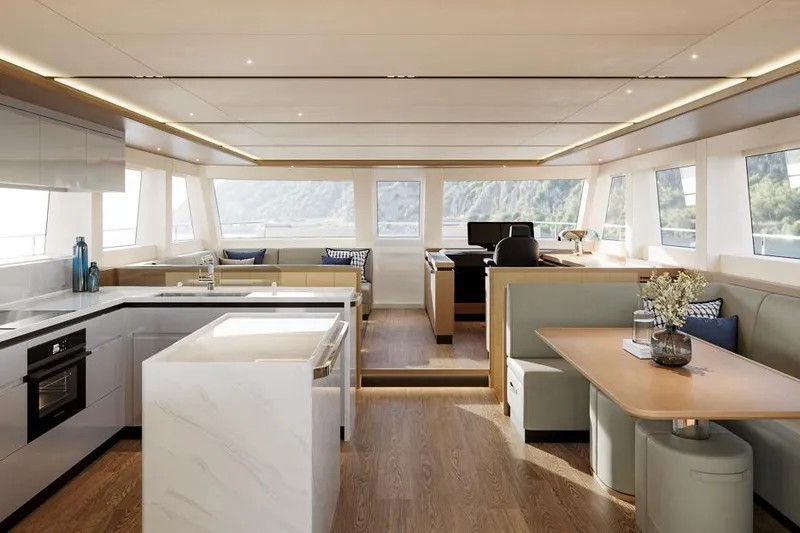 Slide: The Image of Luxurious interior of 2026 ILIAD 60 yacht with modern kitchen and dining area. - 6
