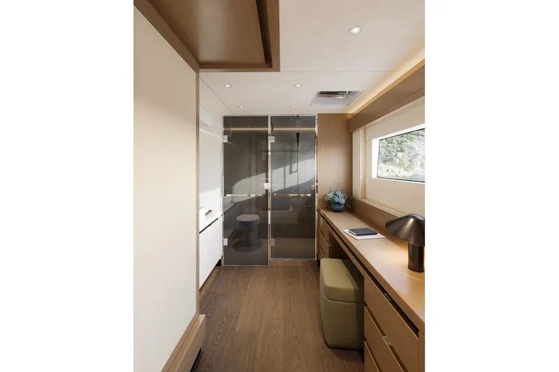 Slide: The Image of Modern yacht interior with sleek design, featuring a desk, window, and glass door. ILIAD 60, 2026. - 7