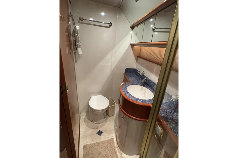 Slide: The Image of Luxurious bathroom in 2001 Neptunus 56 Express yacht with modern fixtures and elegant design. - 30