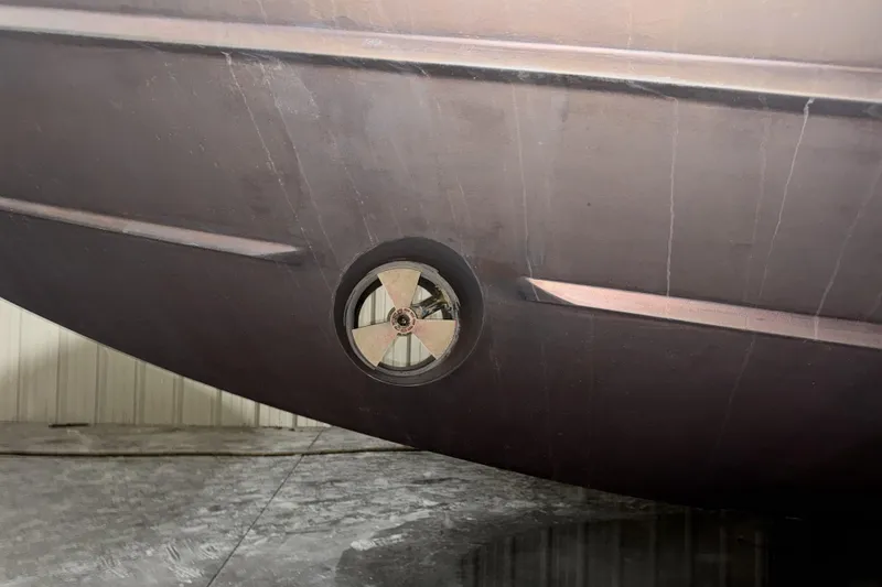 Slide: The Image of Bottom view of a 2001 Neptunus 56 Express yacht hull with visible propeller. - 53