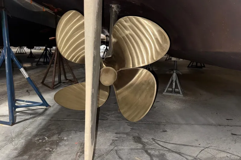 Slide: The Image of Propeller of 2001 Neptunus 56 Express yacht in dry dock setting. - 55