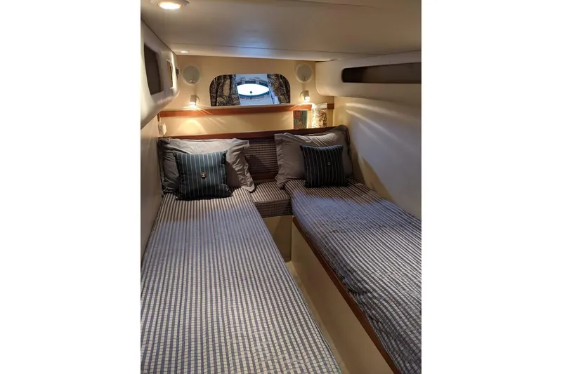 Slide: The Image of 1999 Cruisers Yachts 3870 Esprit cabin with twin beds and nautical decor. - 17