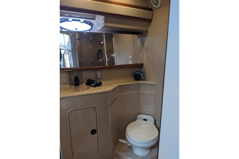 Slide: The Image of Bathroom interior of 1999 Cruisers Yachts 3870 Esprit with sink and toilet. - 18